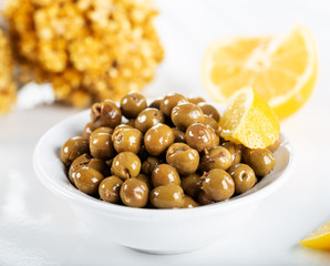Green olives on white background. Green olives from Antakya, Turkey.