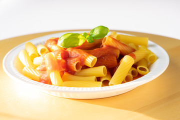 dish with macaroni and tomato sauce