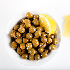 Green olives on white background. Green olives from Antakya, Turkey.