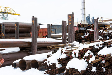 Metal rolling. A round tube different diameter are stacked in storage for sale and loading in stock...