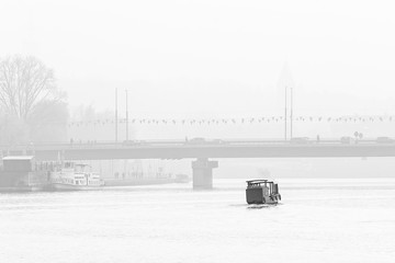Bridge in Krakow in foggy day (Poland). Black and White version.