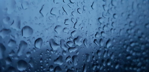 Water droplets on the glass,rain drops background 