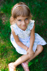 Llittle girl child outdoor in summer day.