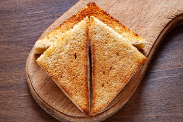 Toast on a wooden background