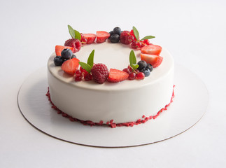 Mousse cake with berries and flowers