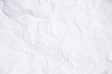 Texture of a rumpled white sheet of paper. Empty background. Option number one. Background for design and typography.