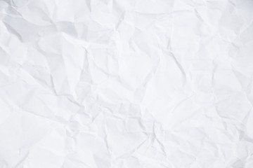 Texture of a rumpled white sheet of paper. Empty background. Option number one. Background for design and typography.