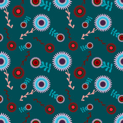 floral ornaments of red and light blue colors on a dark blue color