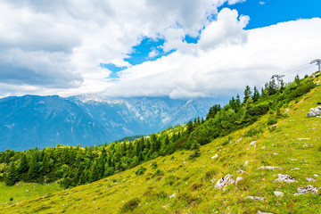 Dramatic and majestic clouds on Slovenia mountains. Clouds above the big mountain in summer...