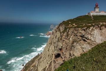 Fototapeta na wymiar View at Cabo da Roca Lighthouse (Portuguese: Farol de Cabo da Roca) which is Portugal's (and continental Europe's) most westerly point.