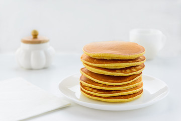 American pancakes on a white plate