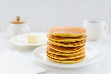 American pancakes on a white plate