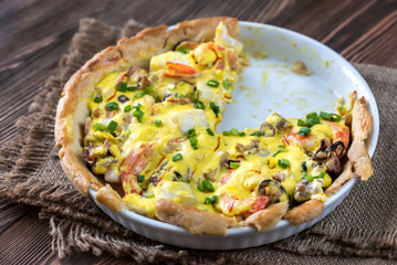 Seafood pie with saffron cream sauce