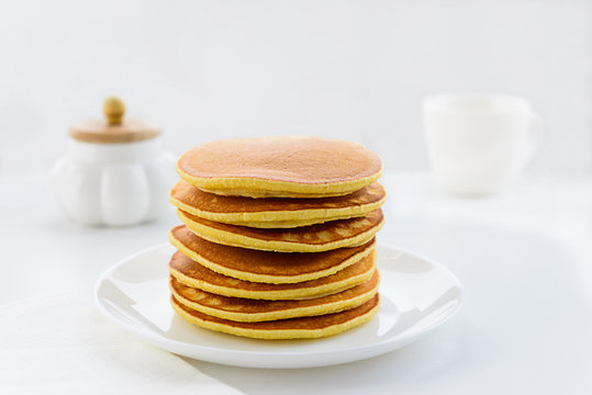 American pancakes on a white plate