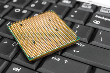 Computer processor on keyboard. Close up.