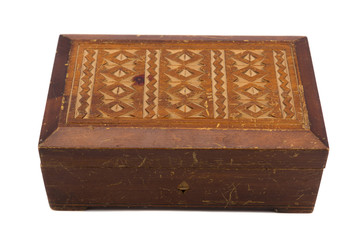 Vintage wooden scratched jewelry box on white background