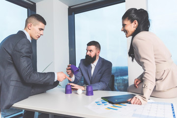 Colleagues playing game on the break in the office