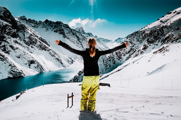 Snow Ski Luxury Resort & Blue Crystal Background. Cute Woman in Mountain. Young Girl in Winter...