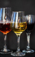 Glassed with drinks on dark background