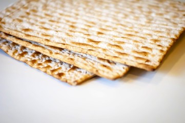 Jewish traditional Matso unleavened bread, matso bread is made during the Jewish Passover Pesach holiday. Pesach concept postcard.