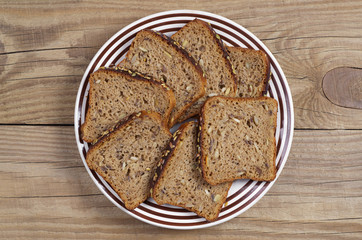 Slices of bread with seeds in a plate
