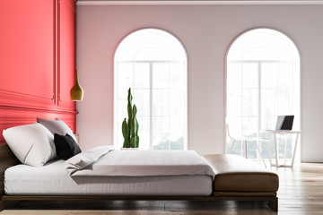 Side view of white and red bedroom