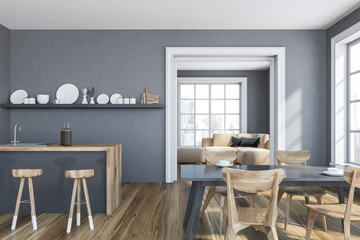 Gray kitchen interior, bar and table