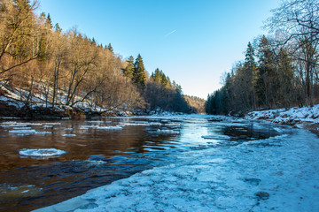 sandstone cliffs on the shore of river Gauja in Latvia