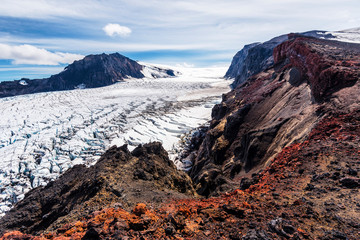 Landscape of  Volcanic rocky slope and and the glassier of Kverkfjoll massif in Vatnajokull National Park