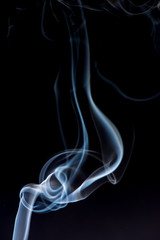 white smoke on black background