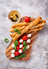 Caprese skewers and grissini bread