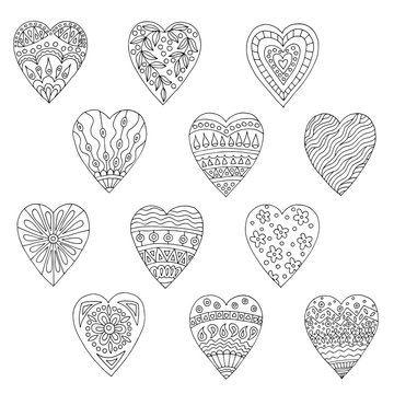 Doodle hearts with patterns for coloring books