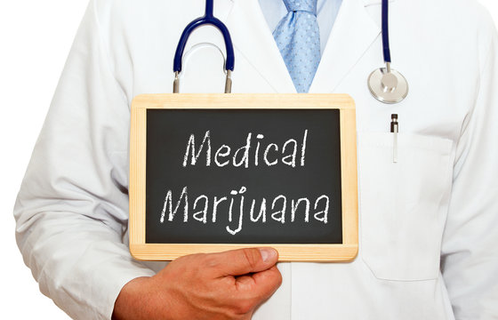 Medical Marijuana, Doctor Holding Chalkboard With Text, White Background