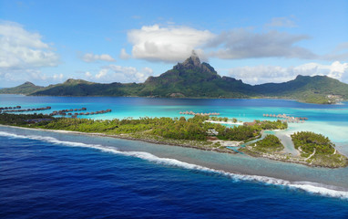 Aerial panoramic landscape view of the island of Bora Bora in French Polynesia with the Mont...