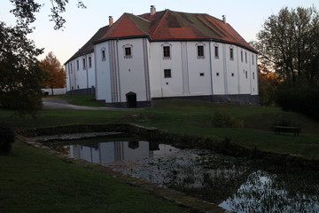 Fototapeta na wymiar Small lake near baroque castle in Chanovice, South Bohemian region, Czech republic