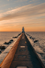 lighthouse pier at sunrise