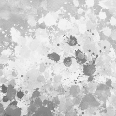 Gray paint splatter effect texture on white paper background. Artistic backdrop. Different paint drops.
