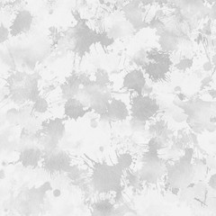 Gray paint splatter effect texture on white paper background. Artistic backdrop. Different paint drops. © artistmef