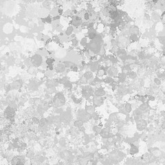 Gray paint splatter effect texture on white paper background. Artistic backdrop. Different paint drops. © artistmef
