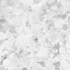 Gray paint splatter effect texture on white paper background. Artistic backdrop. Different paint drops.