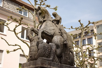 Fototapeta na wymiar Statue of St. George slaying the dragon, Pirmasens, Germany,2017
