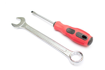 Black and red screwdriver isolated on white background. Screwdriver for repairing and tightening screws. Wrench. Tools for repair