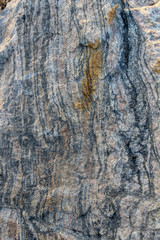 striped rock with rust