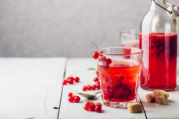 Infused water with red currant and sugar