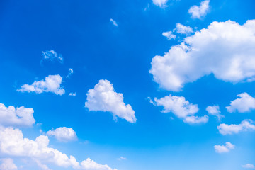 Beautiful white clouds with blue sky.Color shade gradient from white to blue using for fresh background wallpaper.