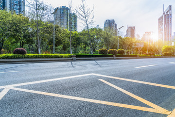 Fototapeta premium empty urban road with modern building in the city.