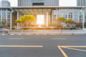 empty urban road with modern building in the city.