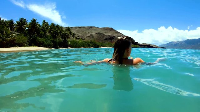 Tahuata Marquesas young female on deserted ocean beach