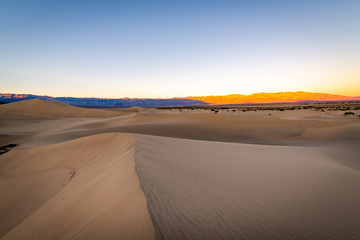 Obraz na płótnie Canvas Sunrise over the Mesquite Flat Sand Dunes