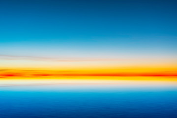 Beautiful blue sky after sunset on sea background.